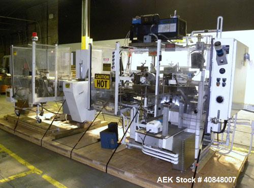 Used Jones Oystar Semi Automatic Vertical Cartoner, Model CMV. Capable of speeds up to 120 rpm. Has 5" centers for a carton size range: length 1" to 4-1/4", width 3/4" to 4-1/4", depth 2-1/8" to 8". ...