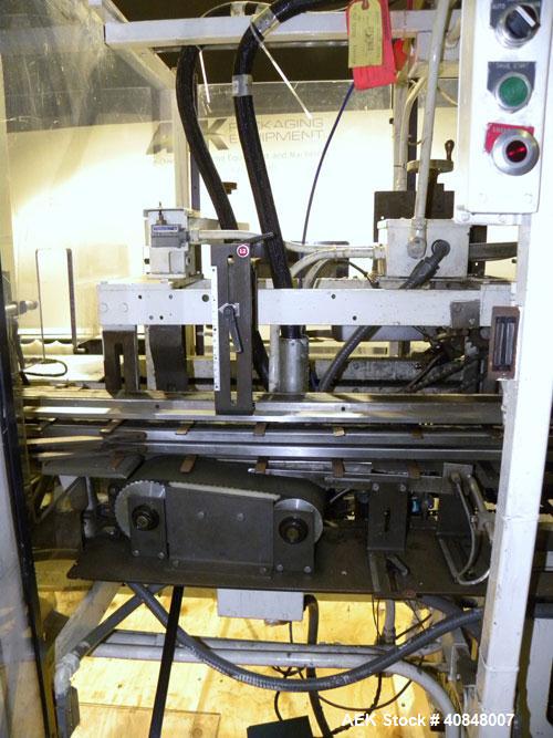 Used Jones Oystar Semi Automatic Vertical Cartoner, Model CMV. Capable of speeds up to 120 rpm. Has 5" centers for a carton size range: length 1" to 4-1/4", width 3/4" to 4-1/4", depth 2-1/8" to 8". ...