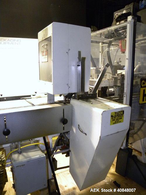 Used Jones Oystar Semi Automatic Vertical Cartoner, Model CMV. Capable of speeds up to 120 rpm. Has 5" centers for a carton size range: length 1" to 4-1/4", width 3/4" to 4-1/4", depth 2-1/8" to 8". ...