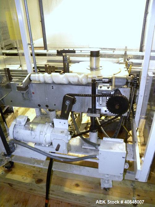 Used Jones Oystar Semi Automatic Vertical Cartoner, Model CMV. Capable of speeds up to 120 rpm. Has 5" centers for a carton size range: length 1" to 4-1/4", width 3/4" to 4-1/4", depth 2-1/8" to 8". ...