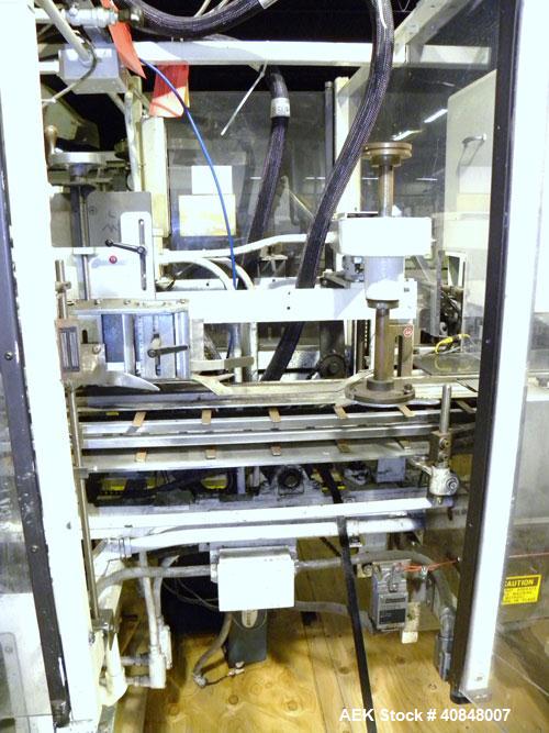 Used Jones Oystar Semi Automatic Vertical Cartoner, Model CMV. Capable of speeds up to 120 rpm. Has 5" centers for a carton size range: length 1" to 4-1/4", width 3/4" to 4-1/4", depth 2-1/8" to 8". ...