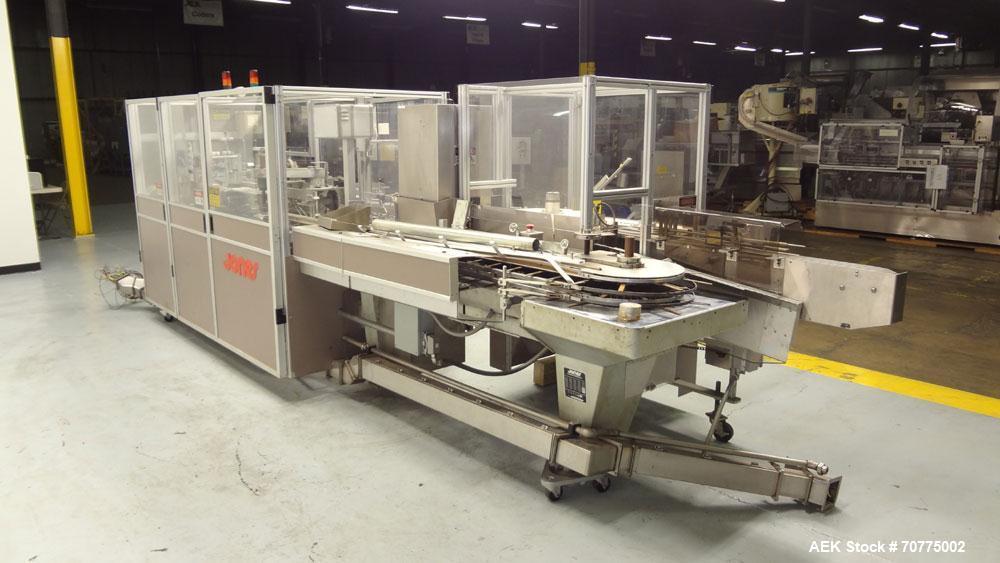 Used Jones CMV-5 Semi- Automatic Vertical Cartoner with bottle loader