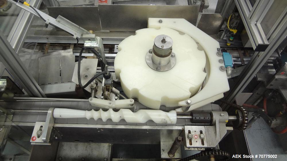 Used Jones CMV-5 Semi- Automatic Vertical Cartoner with bottle loader