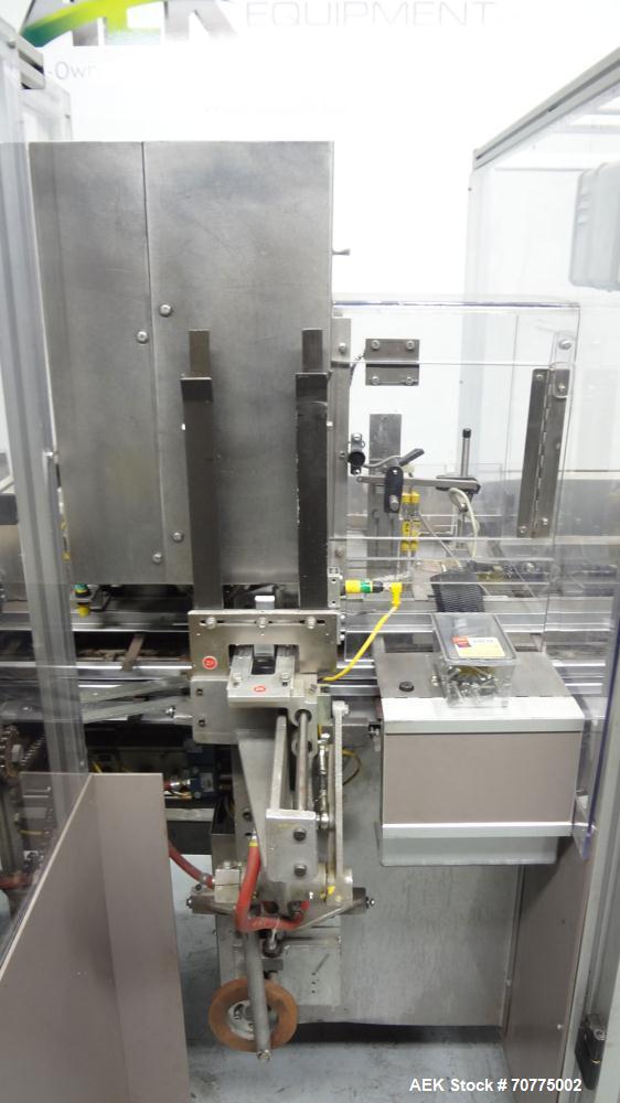 Used Jones CMV-5 Semi- Automatic Vertical Cartoner with bottle loader