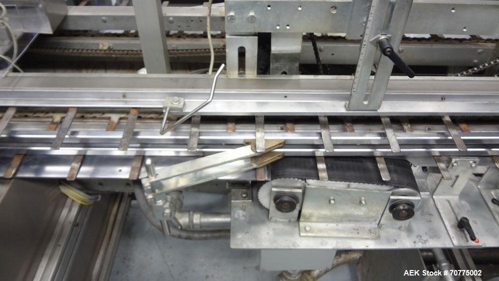 Used Jones CMV-5 Semi- Automatic Vertical Cartoner with bottle loader