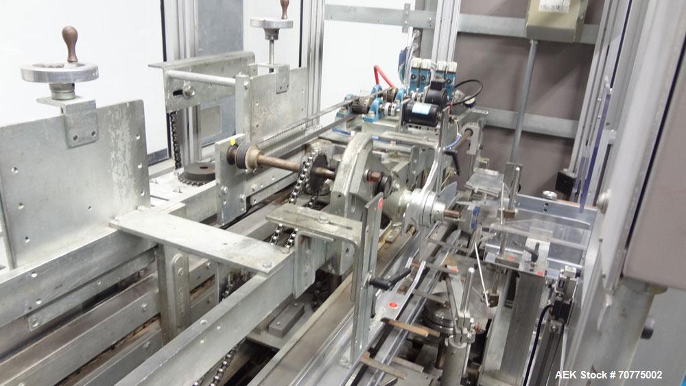 Used Jones CMV-5 Semi- Automatic Vertical Cartoner with bottle loader