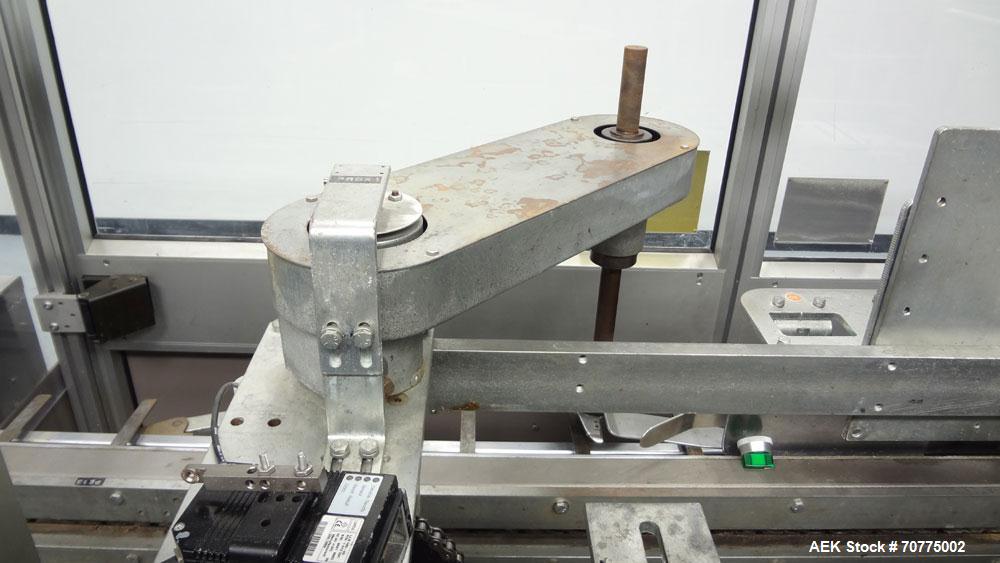 Used Jones CMV-5 Semi- Automatic Vertical Cartoner with bottle loader