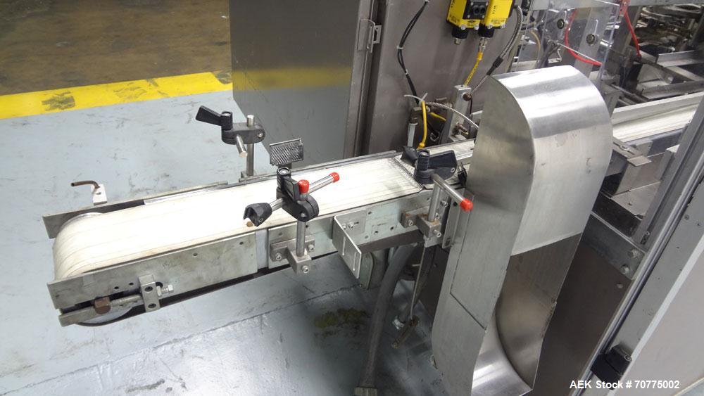 Used Jones CMV-5 Semi- Automatic Vertical Cartoner with bottle loader