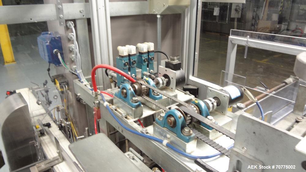 Used Jones CMV-5 Semi- Automatic Vertical Cartoner with bottle loader