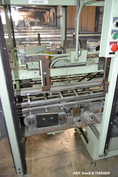 Used Jones Model CMV5 Semi-Automatic Tuck Vertical Cartoner. Machine is capable of speeds up to 120 cartons per minute. Has manual load station of 8' (both sides). Has 5" centers for a carton size ra...