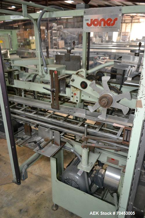 Used Jones Model CMV5 Semi-Automatic Tuck Vertical Cartoner. Machine is capable of speeds up to 120 cartons per minute. Has manual load station of 8' (both sides). Has 5" centers for a carton size ra...