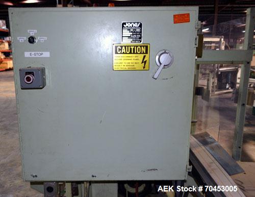 Used Jones Model CMV5 Semi-Automatic Tuck Vertical Cartoner. Machine is capable of speeds up to 120 cartons per minute. Has manual load station of 8' (both sides). Has 5" centers for a carton size ra...