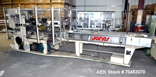 Used Jones Model CMV5 Semi-Automatic Tuck Vertical Cartoner. Machine is capable of speeds up to 120 cartons per minute. Has manual load station of 8' (both sides). Has 5" centers for a carton size ra...