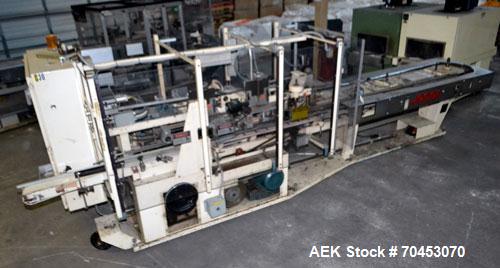 Used Jones Model CMV5 Semi-Automatic Tuck Vertical Cartoner. Machine is capable of speeds up to 120 cartons per minute. Has manual load station of 8' (both sides). Has 5" centers for a carton size ra...