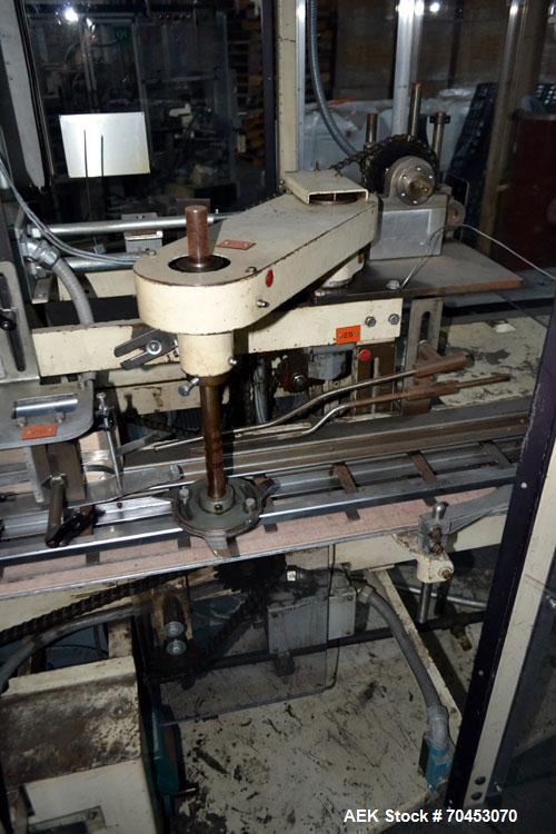 Used Jones Model CMV5 Semi-Automatic Tuck Vertical Cartoner. Machine is capable of speeds up to 120 cartons per minute. Has manual load station of 8' (both sides). Has 5" centers for a carton size ra...