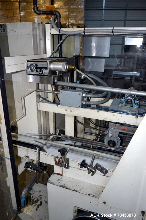 Used Jones Model CMV5 Semi-Automatic Tuck Vertical Cartoner. Machine is capable of speeds up to 120 cartons per minute. Has manual load station of 8' (both sides). Has 5" centers for a carton size ra...