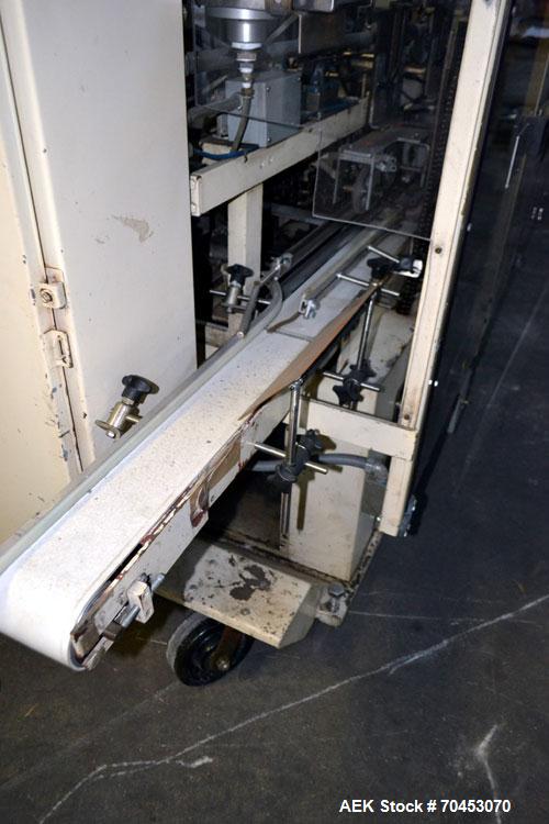 Used Jones Model CMV5 Semi-Automatic Tuck Vertical Cartoner. Machine is capable of speeds up to 120 cartons per minute. Has manual load station of 8' (both sides). Has 5" centers for a carton size ra...