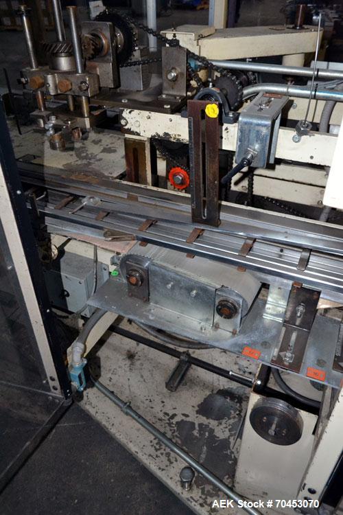 Used Jones Model CMV5 Semi-Automatic Tuck Vertical Cartoner. Machine is capable of speeds up to 120 cartons per minute. Has manual load station of 8' (both sides). Has 5" centers for a carton size ra...