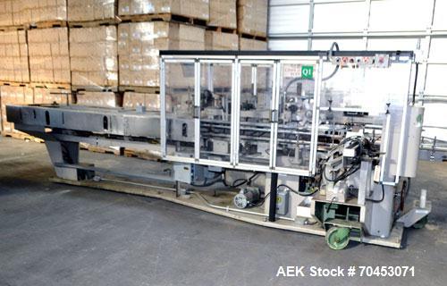 Used Jones Model CMV5 Semi-Automatic Tuck Vertical Cartoner. Machine is capable of speeds up to 120 cartons per minute. Has manual load station of 8' (both sides). Has 5" centers for a carton size ra...