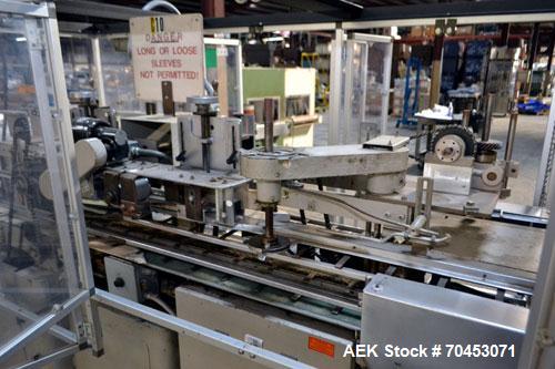 Used Jones Model CMV5 Semi-Automatic Tuck Vertical Cartoner. Machine is capable of speeds up to 120 cartons per minute. Has manual load station of 8' (both sides). Has 5" centers for a carton size ra...