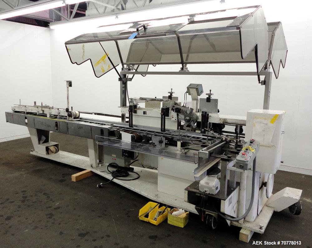 Used Jones Model CMV5 Semi-Automatic Tuck Vertical Cartoner. Machine is capable of speeds up to 120 cartons per minute. Has manual load station of 8' (both sides). Has 5" centers for a carton size ra...