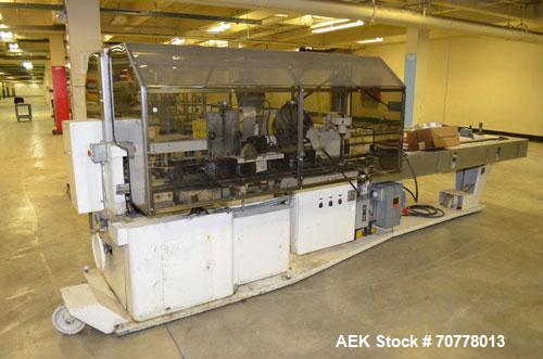 Used Jones Model CMV5 Semi-Automatic Tuck Vertical Cartoner. Machine is capable of speeds up to 120 cartons per minute. Has manual load station of 8' (both sides). Has 5" centers for a carton size ra...