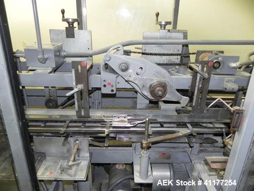 Used Jones CMV8 semi automatic vertical cartoner, Model CMV8