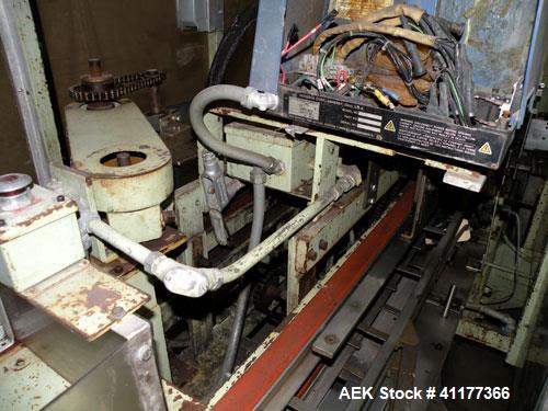 Used Jones CMV8 Continuous Motion Vertical Cartoner.