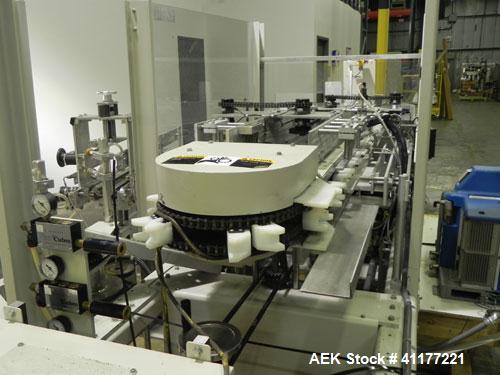 Used Kodiak Tanney Model 601-120 Vertical Cartoner. Capable of speeds up to 120 cartons per minute. Has rotary carton feed, has 9" centers for a carton size range: length 2" to 7", width 1/2" to 3", ...