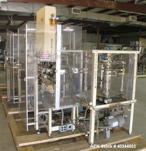 Used Paxall Clybourn Semi Automatic Vertical Hot Melt Cartoner, Model CHL-A. Capable of speeds up to 120 cpm. Has 6' long powered carton magazine with rotary carton feeder. Currently set up on 5" cen...