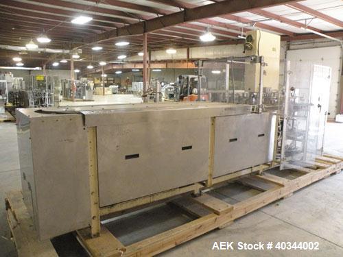 Used Paxall Clybourn Semi Automatic Vertical Hot Melt Cartoner, Model CHL-A. Capable of speeds up to 120 cpm. Has 6' long powered carton magazine with rotary carton feeder. Currently set up on 5" cen...