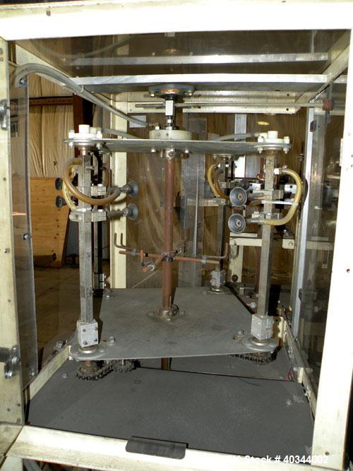 Used Paxall Clybourn Semi Automatic Vertical Hot Melt Cartoner, Model CHL-A. Capable of speeds up to 120 cpm. Has 6' long powered carton magazine with rotary carton feeder. Currently set up on 5" cen...
