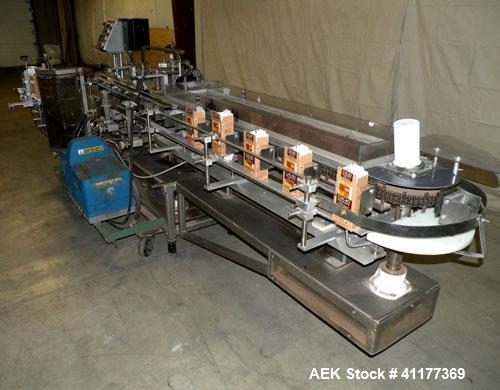 Used Tisma Intermittent Motion Vertical Hot Melt Cartoner, Model TC-50-E. Capable of speeds up to 60 CPM. Has 10" centers, two head rotary carton feeder with 36" long carton magazine and 5' load area...