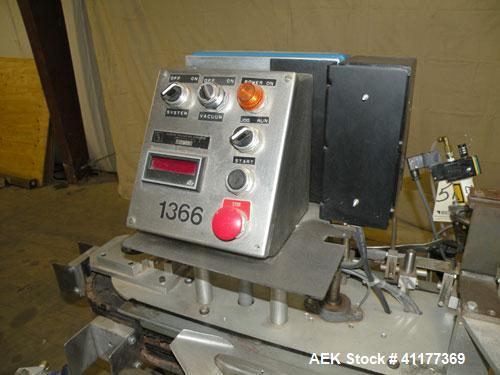 Used Tisma Intermittent Motion Vertical Hot Melt Cartoner, Model TC-50-E. Capable of speeds up to 60 CPM. Has 10" centers, two head rotary carton feeder with 36" long carton magazine and 5' load area...
