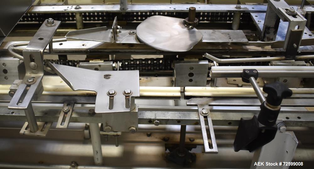 Used Clybourn CHL Vertical Hand Load Hot Melt Glue Cartoner. Capable of speeds from 10 to 100 cartoners per minute. Set on 10" centers for a carton size range: 1" to 8-1/4" length x 3/4" to 3-1/4" wi...