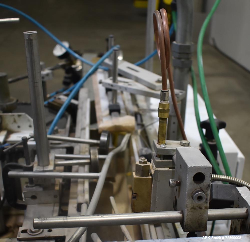 Used Clybourn CHL Vertical Hand Load Hot Melt Glue Cartoner. Capable of speeds from 10 to 100 cartoners per minute. Set on 10" centers for a carton size range: 1" to 8-1/4" length x 3/4" to 3-1/4" wi...