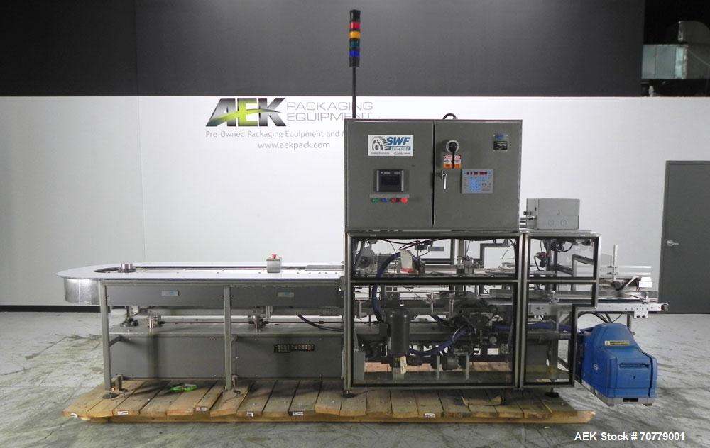 Used Tisma (SWF) VT-100-RH Vertical Cartoner with glue flap closures. Capable of speeds up to 200 cartons per minute. Unit has 7.5" centers for a carton size range: length 1" to 6.25", width .5" to 3...