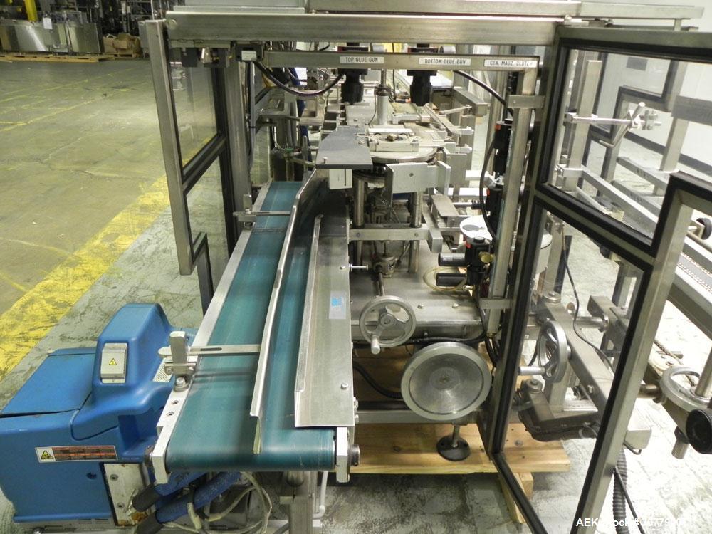Used Tisma (SWF) VT-100-RH Vertical Cartoner with glue flap closures. Capable of speeds up to 200 cartons per minute. Unit has 7.5" centers for a carton size range: length 1" to 6.25", width .5" to 3...