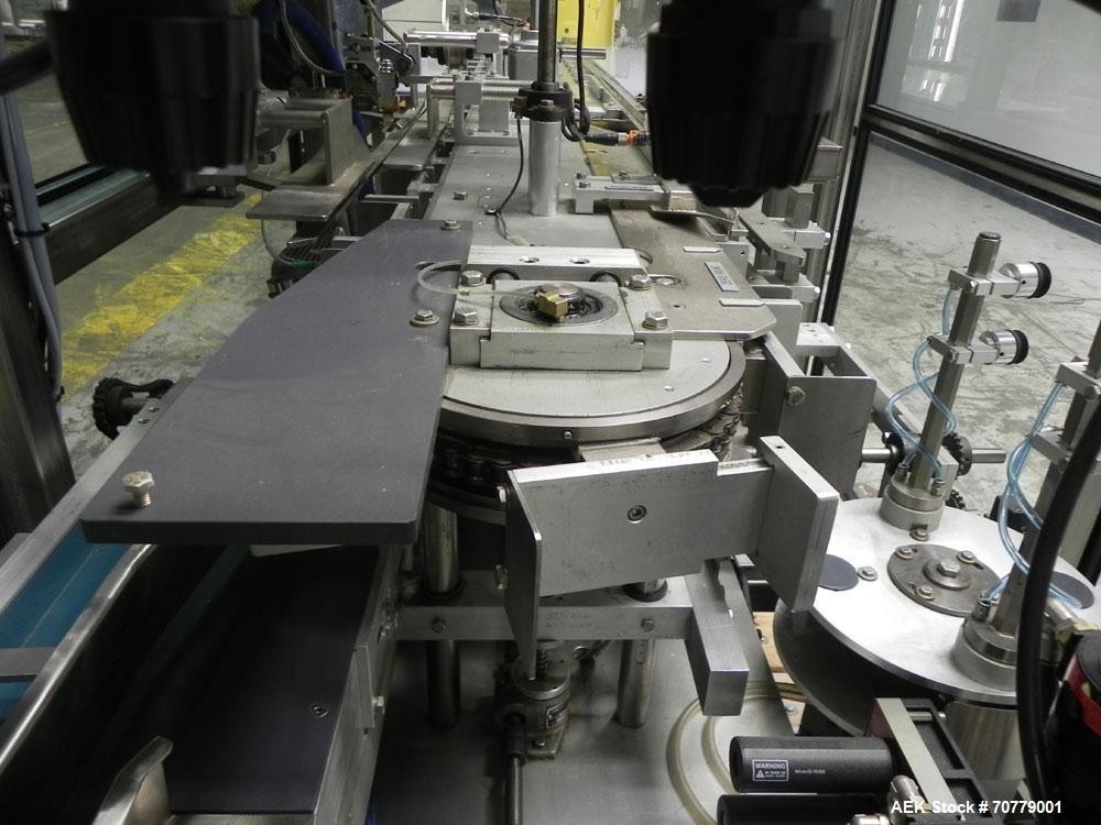 Used Tisma (SWF) VT-100-RH Vertical Cartoner with glue flap closures. Capable of speeds up to 200 cartons per minute. Unit has 7.5" centers for a carton size range: length 1" to 6.25", width .5" to 3...