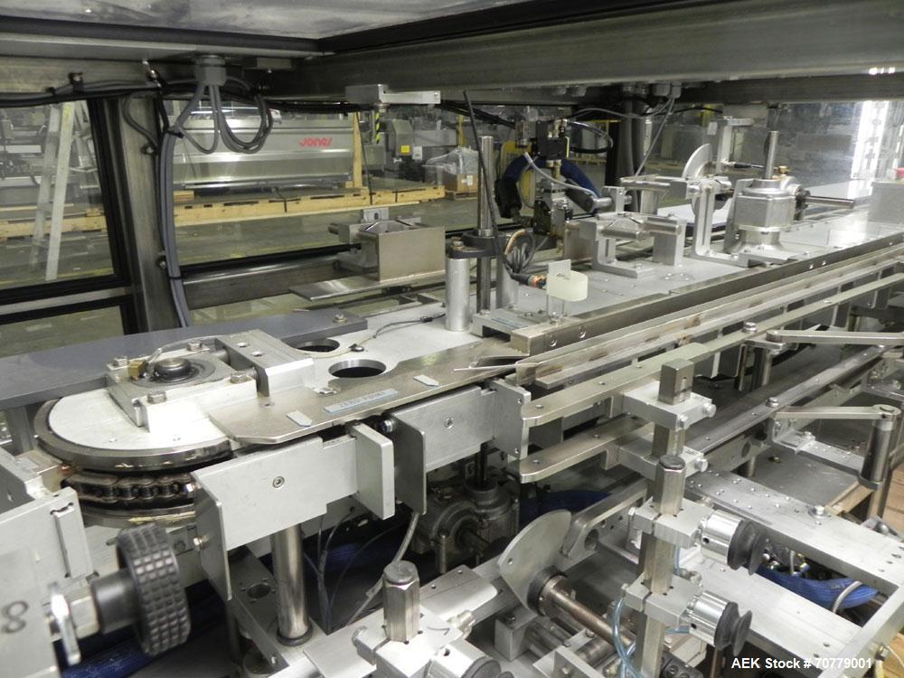 Used Tisma (SWF) VT-100-RH Vertical Cartoner with glue flap closures. Capable of speeds up to 200 cartons per minute. Unit has 7.5" centers for a carton size range: length 1" to 6.25", width .5" to 3...