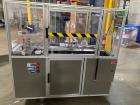 Used: Bivans Model 54L Semi Automatic Vertical Cartoner (carton former and bottom sealer). Capable of speeds up to 60 cartons per minute. Has a carton size range: 7/8