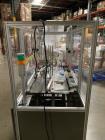Used: Bivans Model 54L Semi Automatic Vertical Cartoner (carton former and bottom sealer). Capable of speeds up to 60 cartons per minute. Has a carton size range: 7/8