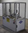 Used- Bivans 54L Carton Former and Bottom Closer. Capable of speeds up to 60 cartons per minute. Has a carton size range: (L...