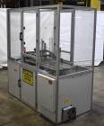 Used- Bivans 54L Carton Former and Bottom Closer. Capable of speeds up to 60 cartons per minute. Has a carton size range: (L...