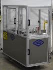 Used- Bivans 54L Carton Former and Bottom Closer. Capable of speeds up to 60 cartons per minute. Has a carton size range:  1...