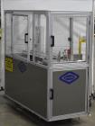 Used Bivans 54L Carton Former and Bottom Closer. Capable of speeds up to 60 cartons per minute. Has a carton size range:  1/2
