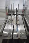 Used- Bivans 54L Carton Former and Bottom Closer. Capable of speeds up to 60 cartons per minute. Has a carton size range:  1...