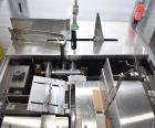 Used Bivans 54L Carton Former and Bottom Closer. Capable of speeds up to 60 cartons per minute. Has a carton size range:  1/2