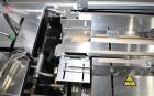 Used Bivans 54L Carton Former and Bottom Closer. Capable of speeds up to 60 cartons per minute. Has a carton size range:  1/2