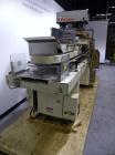 Used Bivans Vertuck Semi Automatic Vertical Cartoner, Model 74G. Capable of speeds up to 120 CPM. Has 6